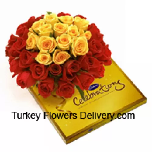 Buchet de 24 trandafiri roșii și 12 galbeni cu umpluturi sezoniere împreună cu o cutie frumoasă de ciocolată Cadbury