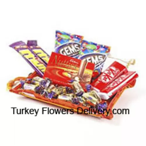 Prezentowane w paczce różnorodne czekoladki (Ten produkt musi być dostarczony z kwiatami)