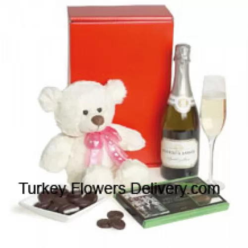 Este exclusivo cesto de vino viene con Pierre Legendre Brut Sparkling (Francia) acompañado de un oso de peluche blanco lindo de 8 pulgadas y una caja de chocolate importado. (El contenido de la canasta, incluido el vino, puede variar según la temporada y la ubicación de entrega. En caso de indisponibilidad de cierto producto, lo sustituiremos por un producto de igual o mayor valor)